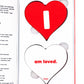 Open Affirmation Matchdeck box displaying two heart-shaped card decks with 'I' and 'am loved' text